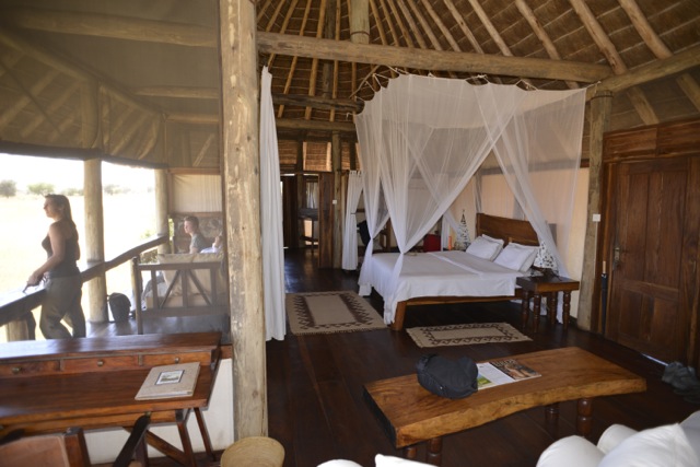 Uganda family safari: room with verandah, bed, mosquito nets. Copyright©2015 reserved to photographer. Contact mapandfamily.com