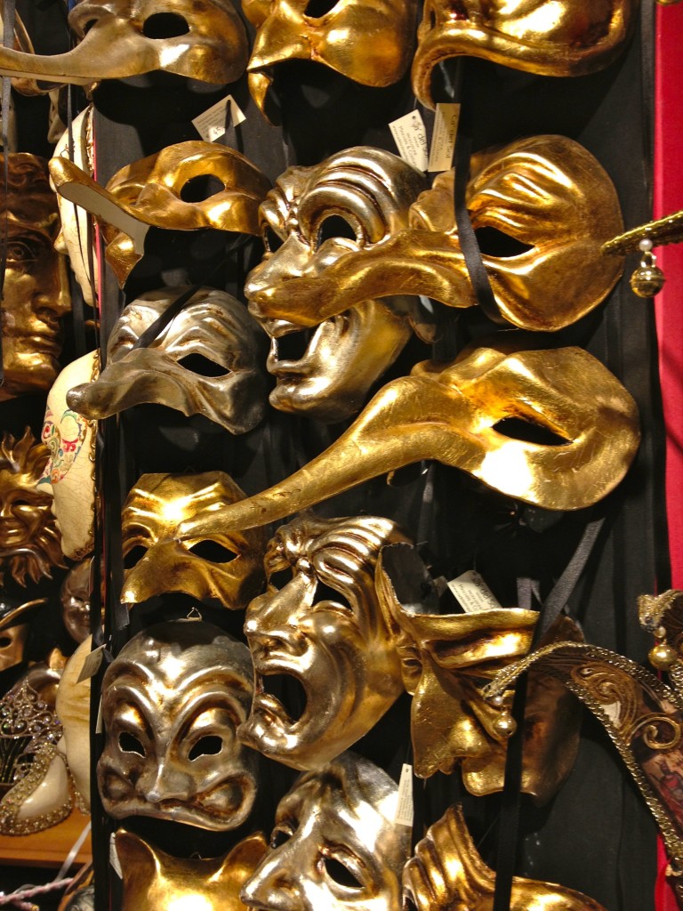 Venice with teens: gold carnival masks. Copyright©2015 reserved to photographer. Contact mapandfamily.com