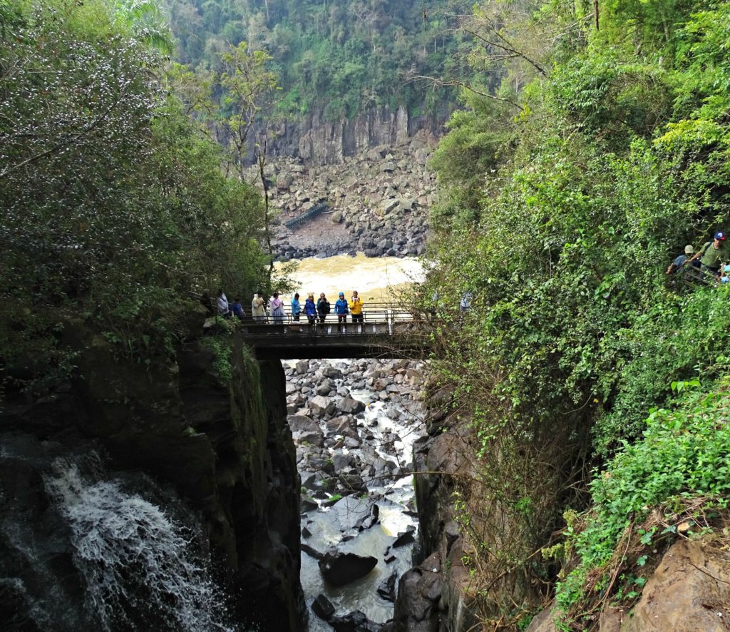Family holiday Iguacu falls visitors above gorge. Copyright©2016 reserved to photographer via mapandfamily.com