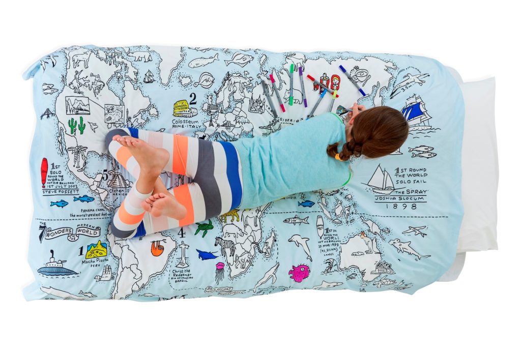 Map print Christmas gifts, girl colouring a duvet cover. Copyright@2017 reserved to photographer.