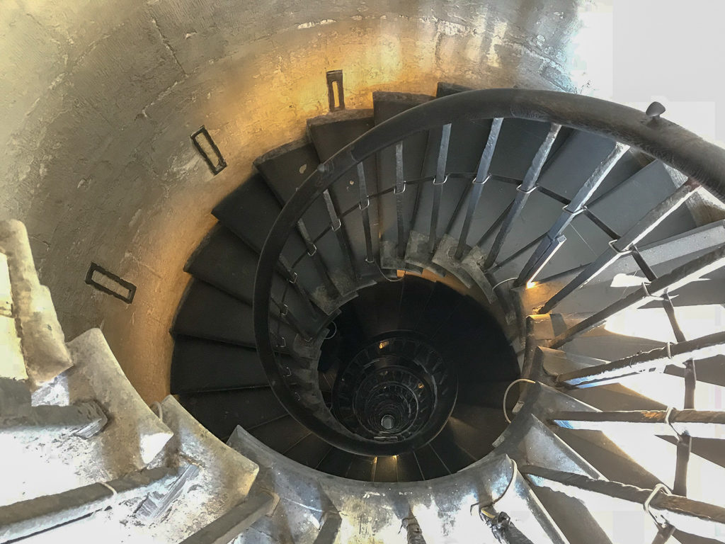 Panoramic views of London. A view down the spiral stairs of The Monument. Copyright ©2018 mapandfamily.com 