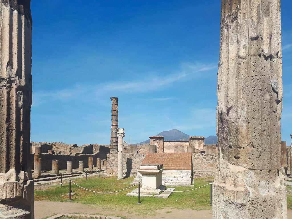 Pompeii ruins with Vesuvius in background. A day trip from Naples