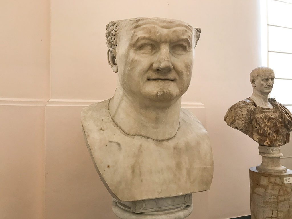 Large portrait head of Vespasian with top of head missing in Archeological Museum in Naples. 