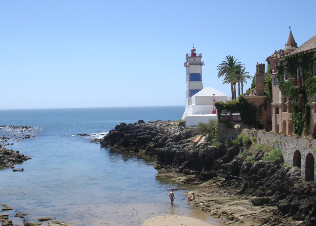 Beaches near Lisbon. Blue and white lighthouse in Cascais. Copyright©2015 reserved to photographer. Contact mapandfamily.com