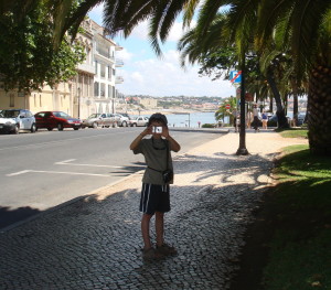 boy with camera in Lisbon. Copyright reserved to the photographer. Contact mapandfamily.com