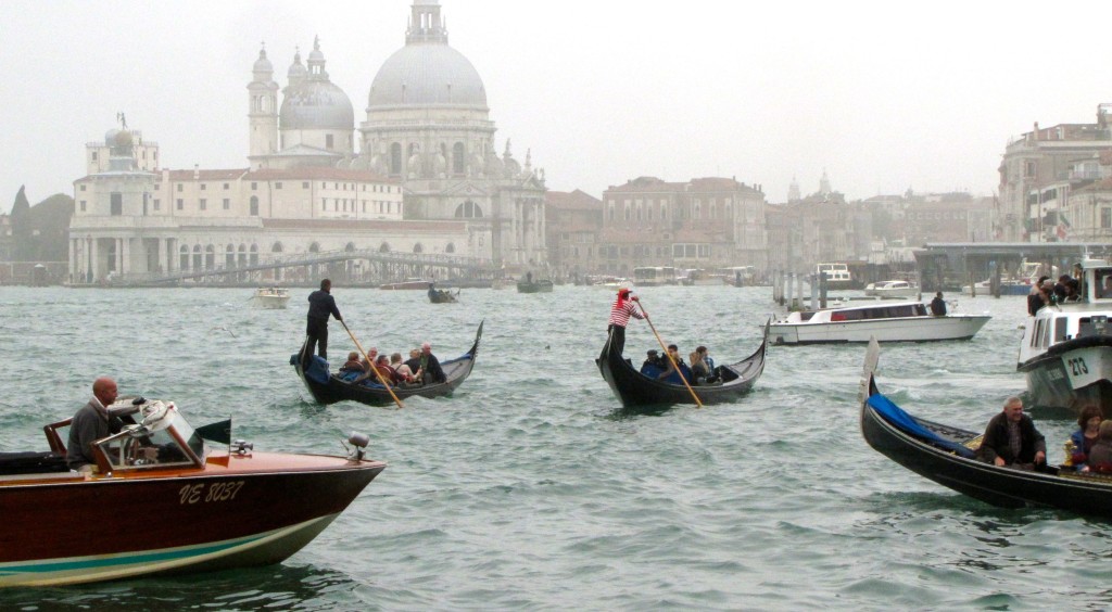 Venice with teenagers: Gondolas on misty day. Copyright©2015 reserved to photographer. Contact mapandfamily.com