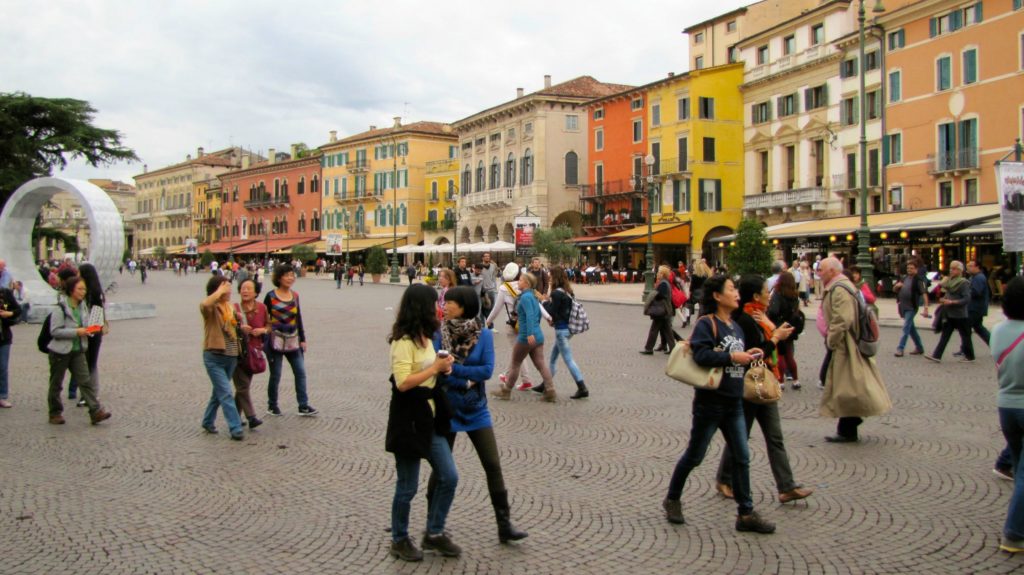 Venice with teens: colourful Piazza Bra in Verona. Copyright©2015 mapandfamily.com