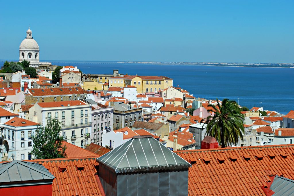 Family holidays in Lisbon. View of Tagus and red rooftops. Copyright ©2015 reserved to photographer via mapandfamily.com 