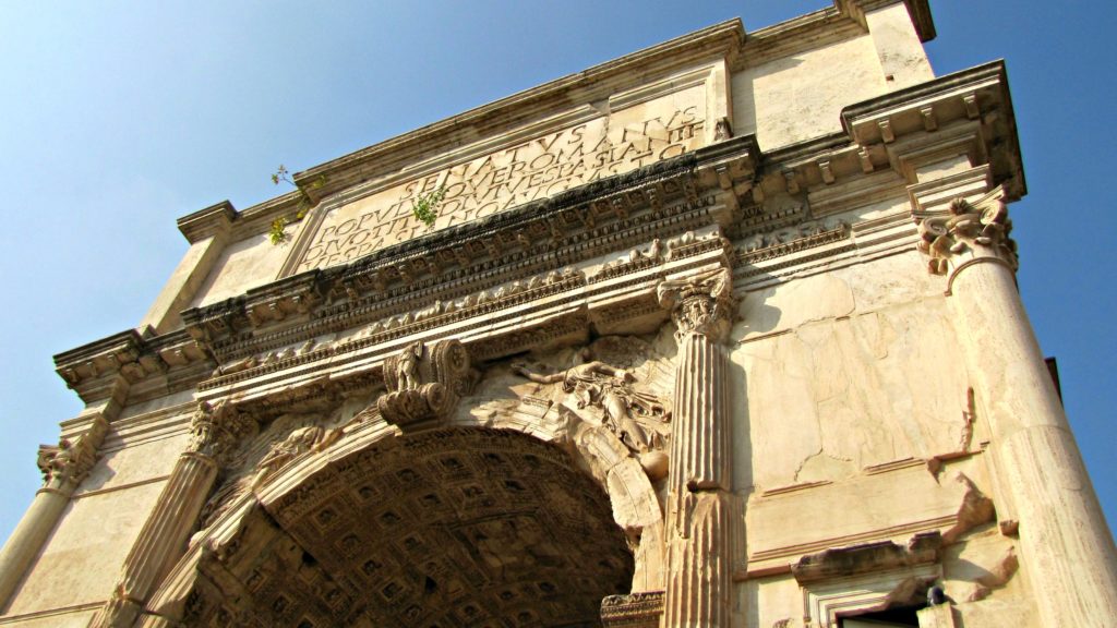Rome with teenagers: looking up at the Arch in the Forum. Copyright©2016 reserved to photographer via mapandfamily.com