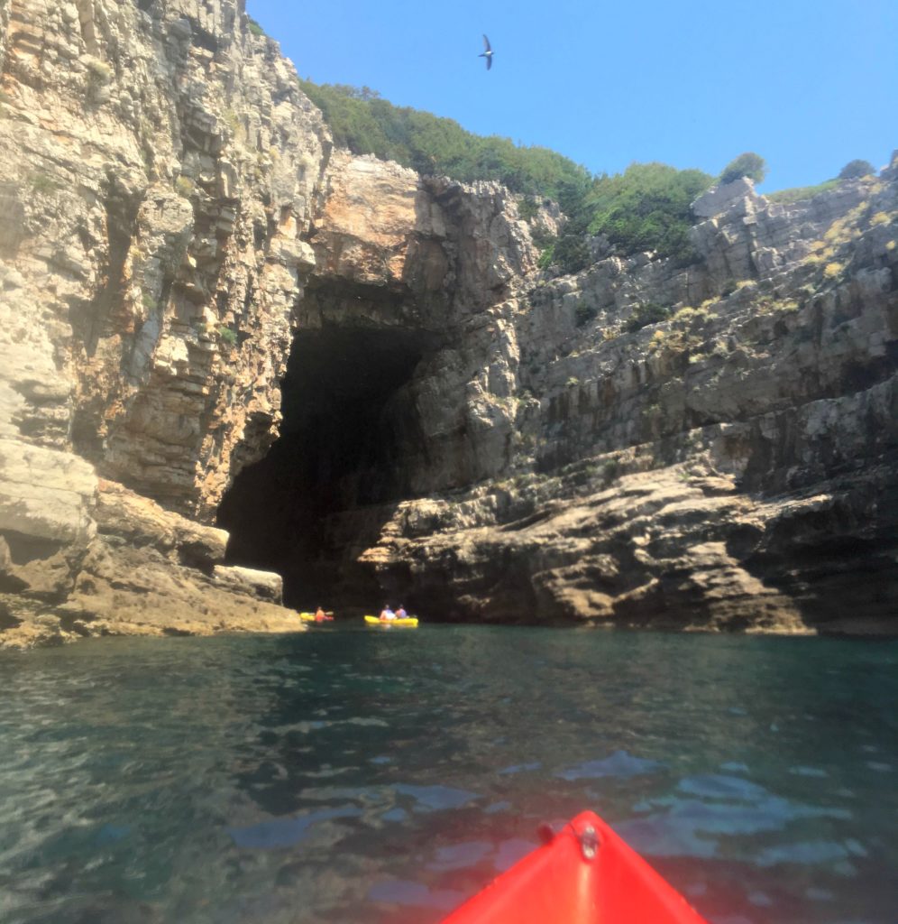 Dubrovnik kayaking near cave on Lokrum island. Copyright©2017 mapandfamily.com