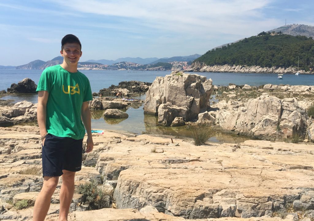 Dubrovnik in June. Boy standing on rocks at Lokrum Copyright©2017 reserved to photographer via mapandfamily.com 