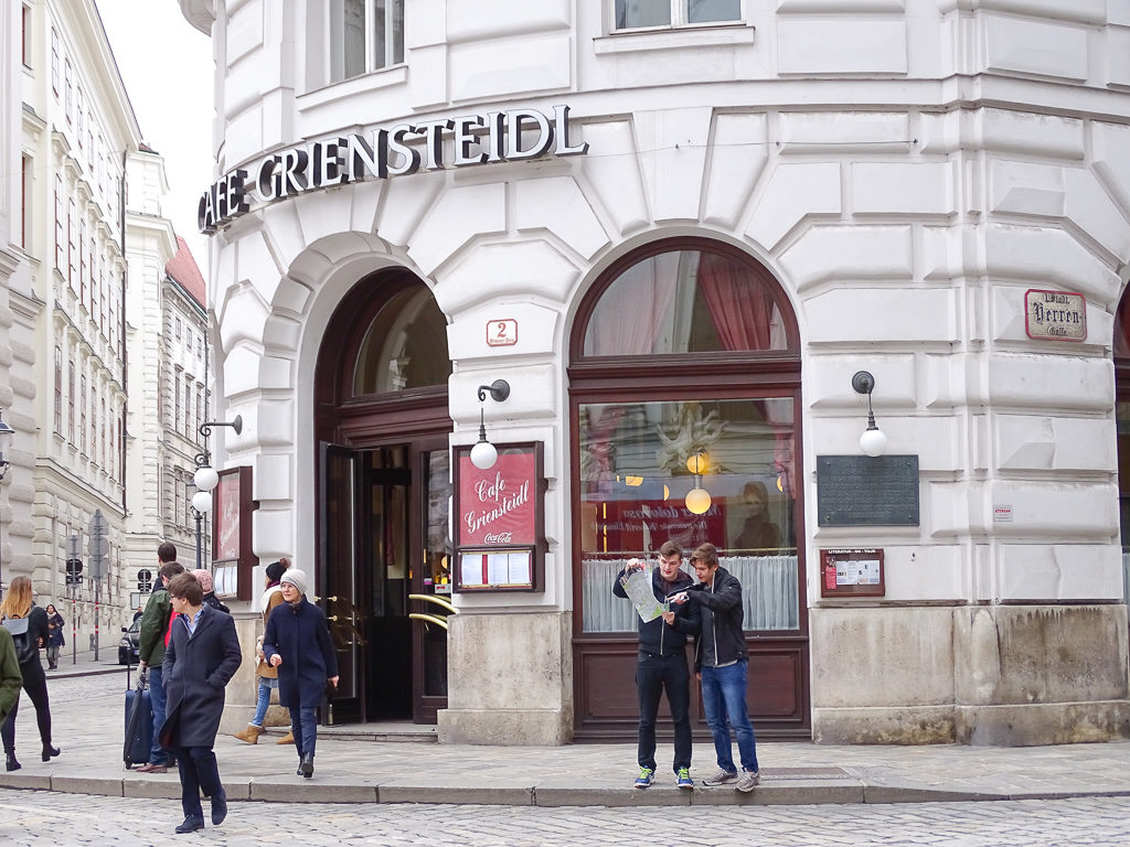 Things to do in Vienna with teens: looking at map outside Cafe Griensteidl Copyright©2018 reserved to photographer via mapandfamily.com 