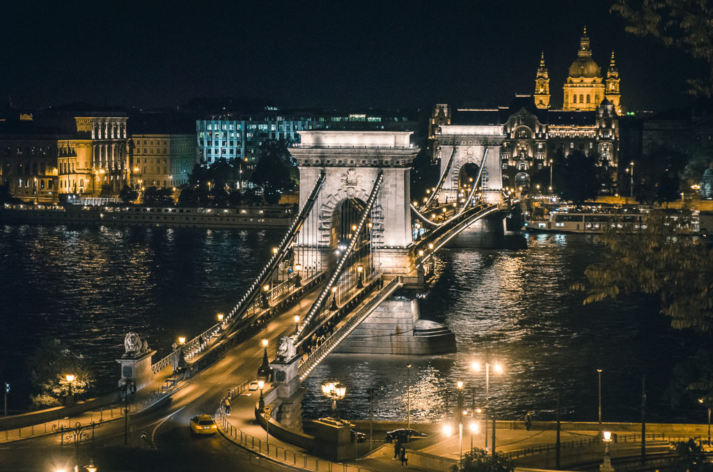 Budapest bridge illuminated at night, a popular city on interrail routes in Europe