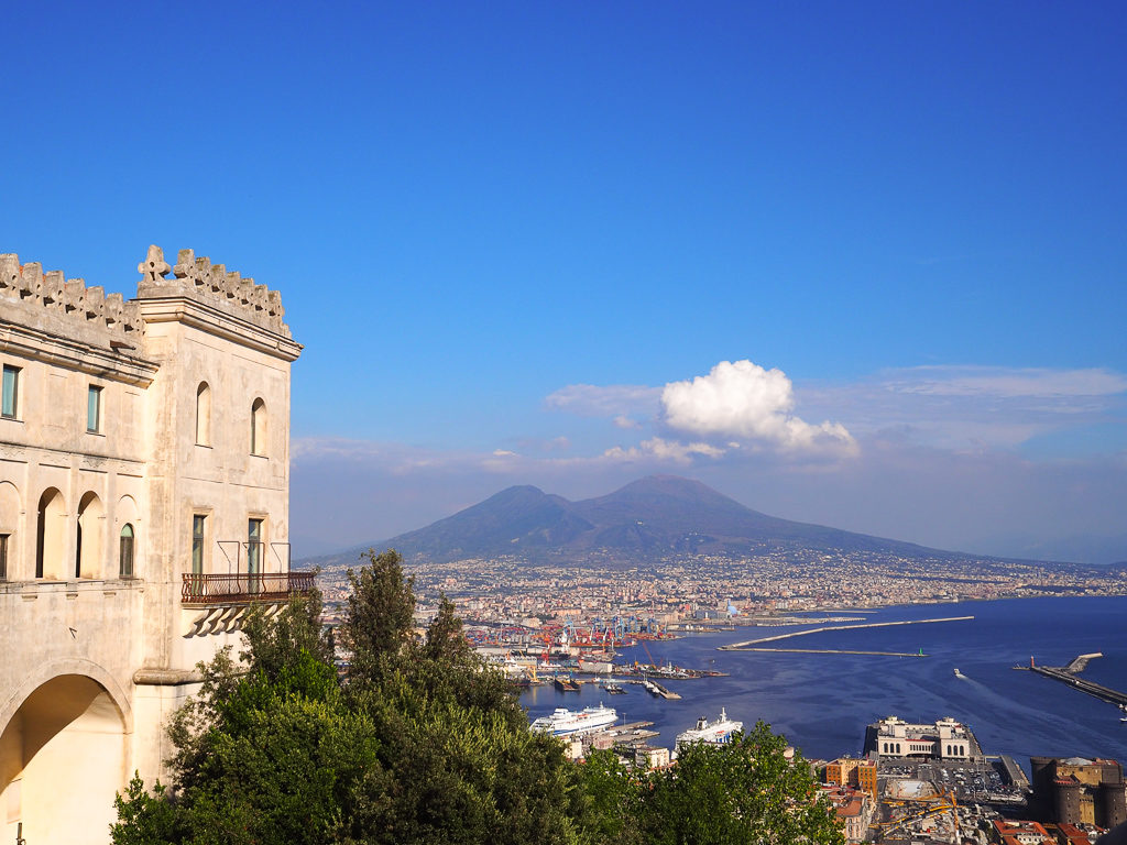 View of Naples bay and Vesuvius with blue sky and white cloud from Certosa.