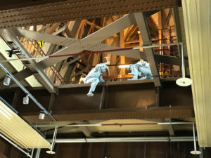Models of workmen on a ceiling beam inside the Tower Bridge exhibition. Copyright ©2018 mapandfamily.com 