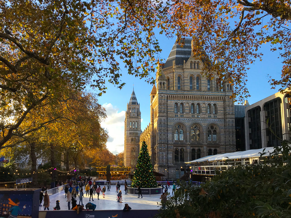 Blue sky above Natural History Museum and ice rink. Copyright ©2018 mapandfamily.com 
