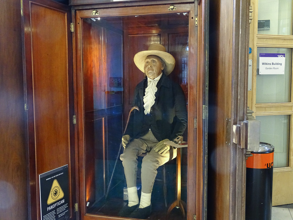 Figure of Jeremy Bentham in period dress in glass case. Copyright ©2019 mapandfamily.com 
