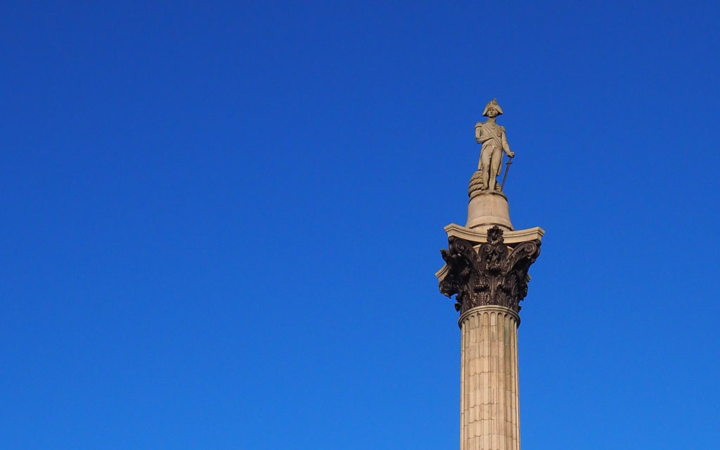 Statue of Nelson at top of column in Trafalgar Square London. London with teenagers. Copyright ©2019 mapandfamily.com 