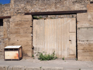 Plaster cast of door in Pompeii. Copyright©2019 mapandfamily.com