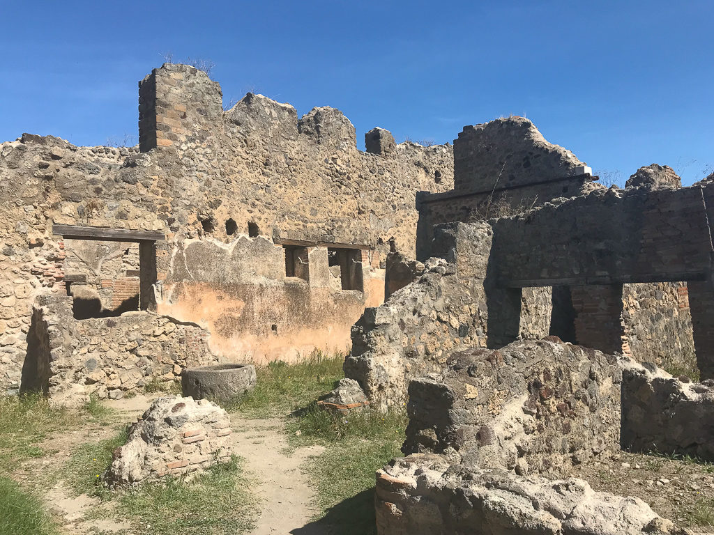 Ruins of stone buildings at Pompeii. Italy. Copyright©2019 mapandfamily.com