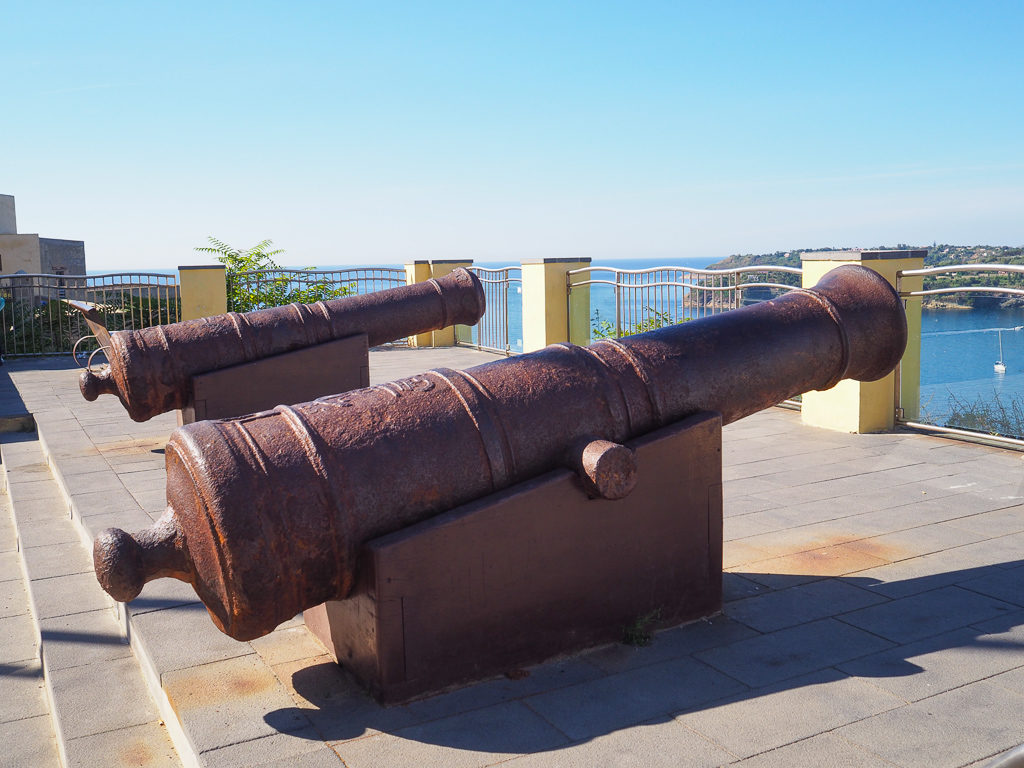 Procida island. Two cannon on viewing terrace above Corricella. Copyright©2019 mapandfamily.com 