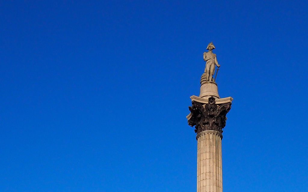 London 2 day itinerary. Nelson's column against a blue sky. Copyright ©2019 mapandfamily.com 