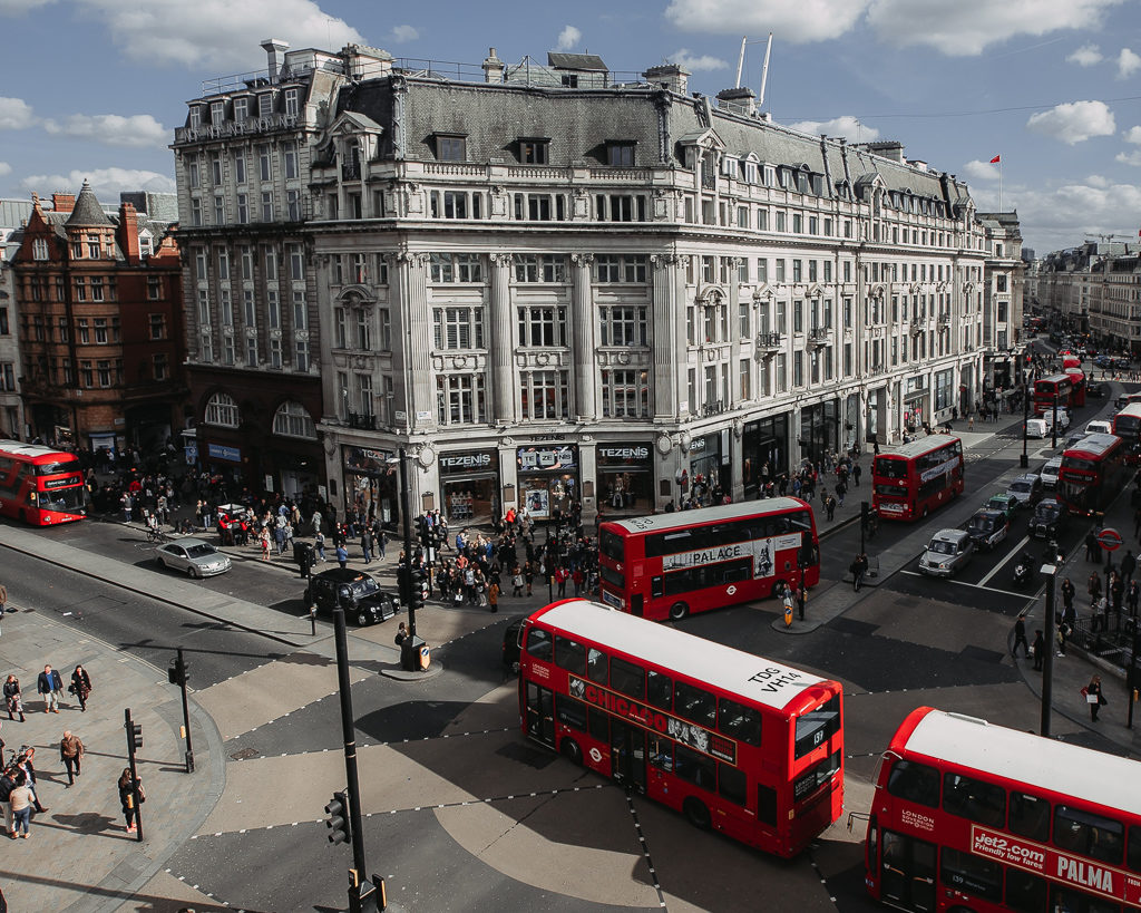 Things to do in London. Looking down on buses at Oxford Circus. Photo by Krists Luhaers on Unsplash