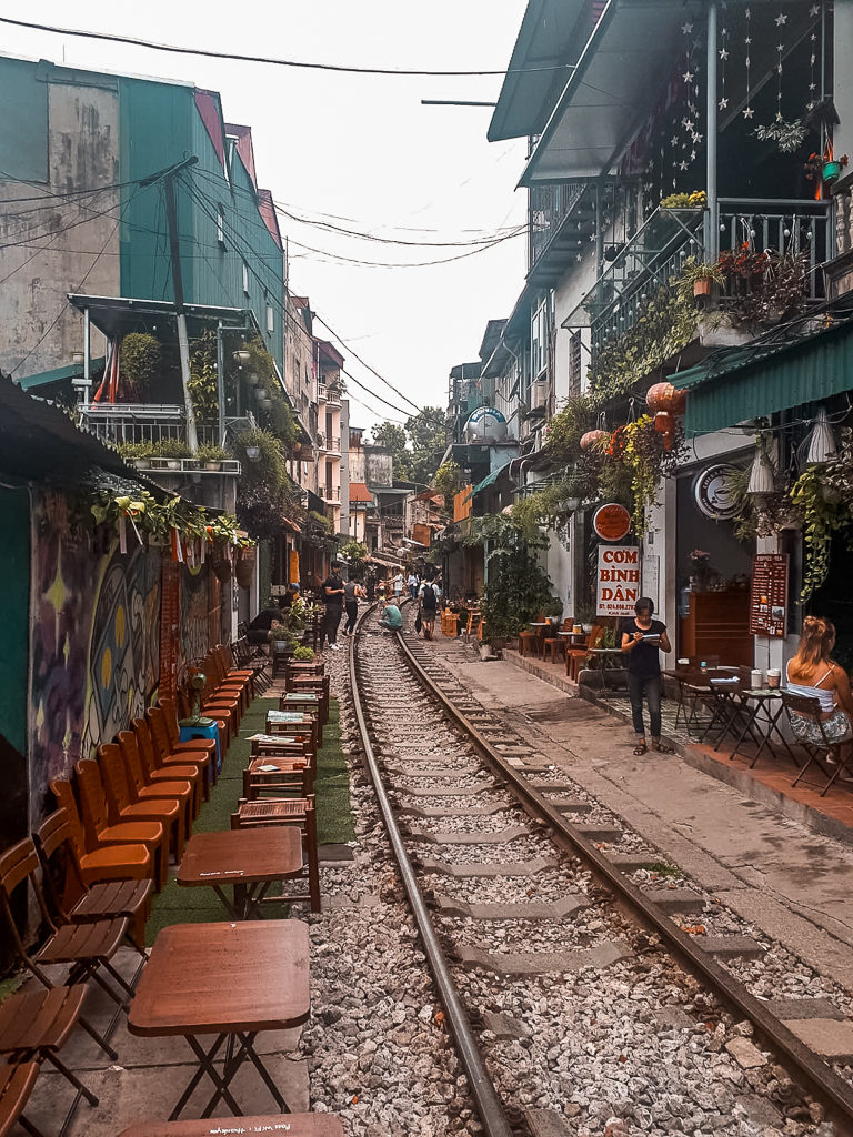 3 days in Hanoi. Narrow street with a railway line running down the middle of it. Copyright ©2019 mapandfamily.com.