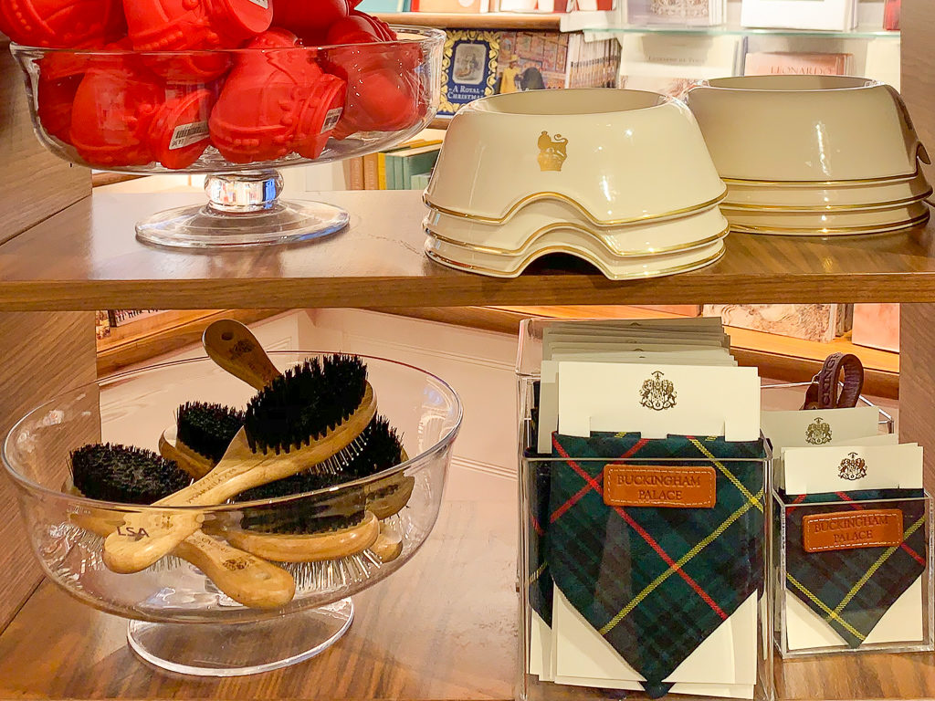 Dog bowls, toys and accessories on display in a Buckingham Palace gift shop.Copyright ©2019 mapandfamily.com