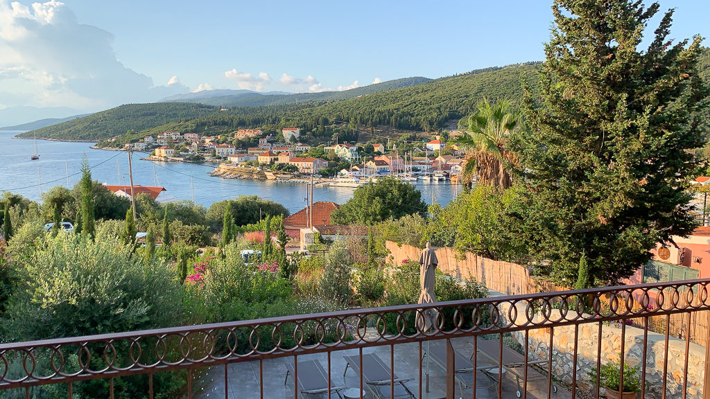 Where to stay in Fiscardo, Kefalonia. View from balcony looking down on Fiscardo bay and village. Copyright©2019 mapandfamily.com 