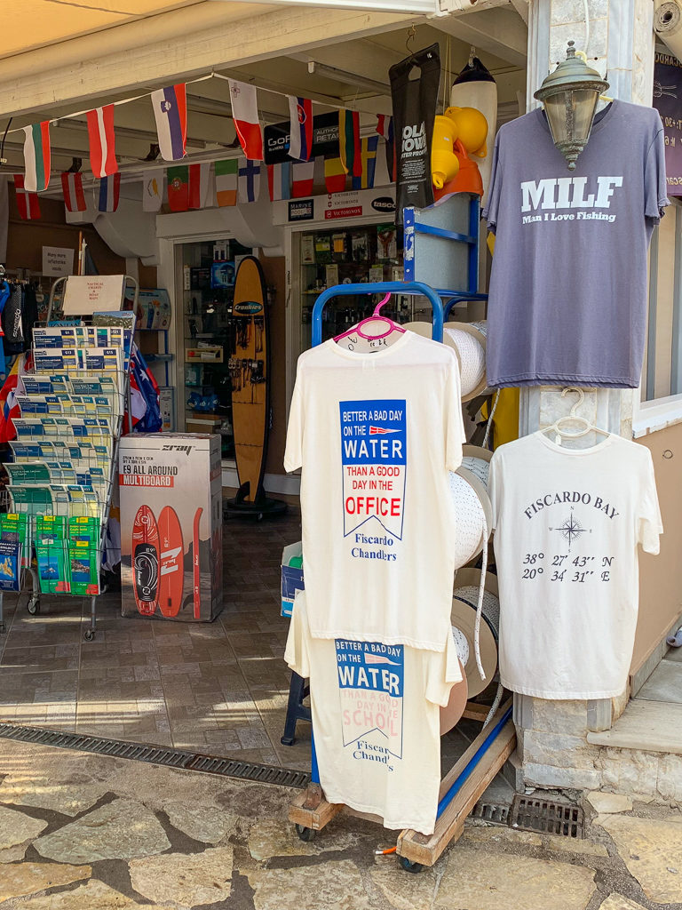 Tee-shirts hanging outside a souvenir shop in Fiscardo Kefalonia