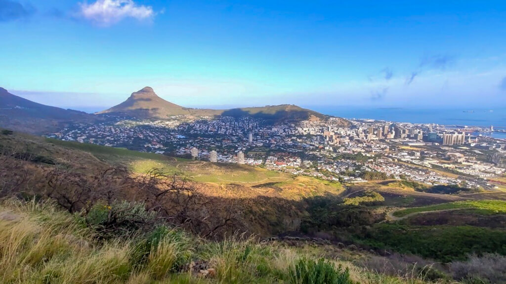 View of Lions Head and Signal Hill from slopes of Table Mountain. Copyright@2023 reserved to photographer via mapandfamily.com
