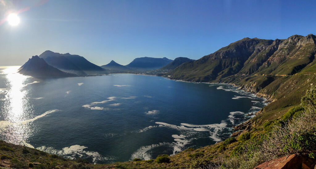 Panoramic view of wide bay surrounded by a mountainous coastline. Copyright@2023 reserved to photographer via mapandfamily.com 