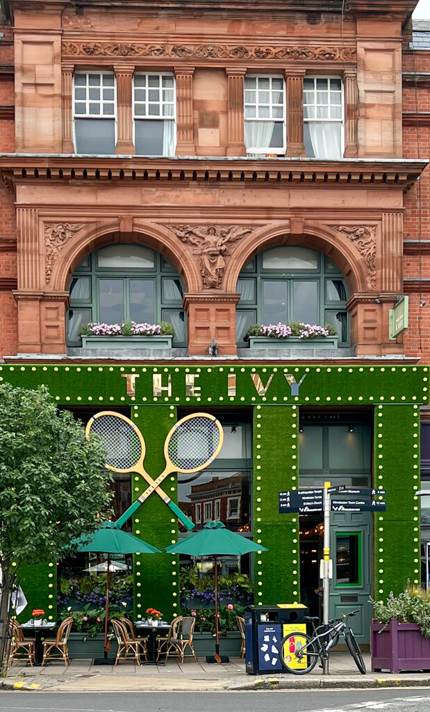 The Ivy Cafe in Wimbledon with tennis racquet decoration on frontage.Copyright@2023mapandfamily.com 