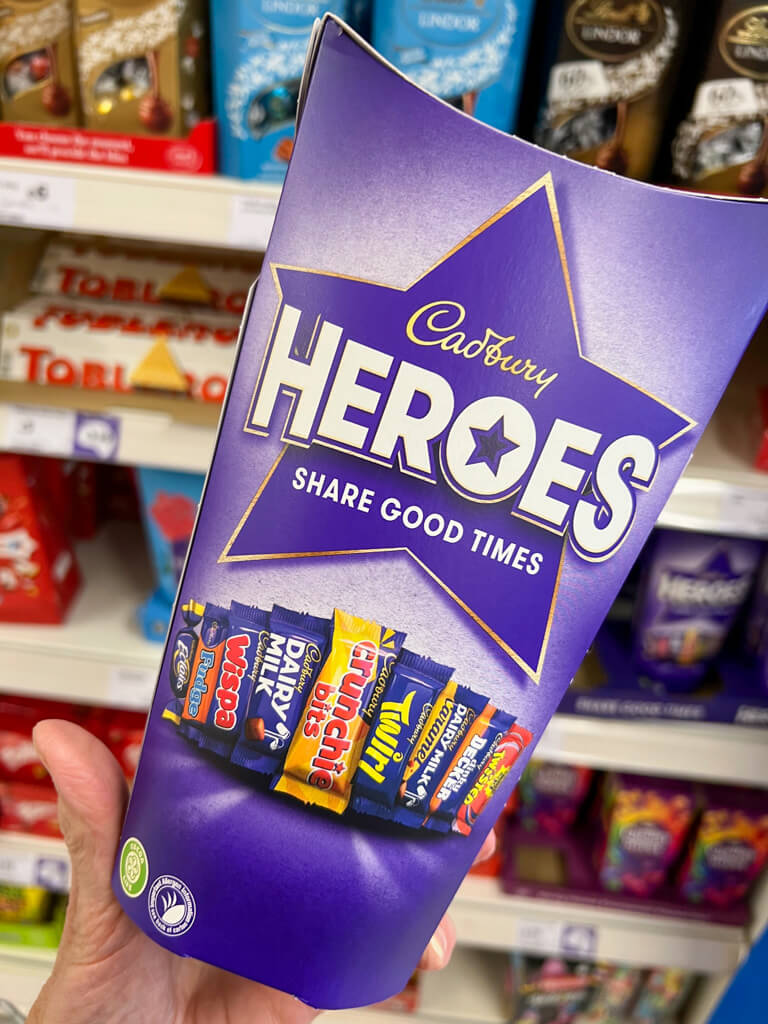 A carton of Heroes: miniature sizes of popular chocolate bars. Copyright@2023 mapandfamily.com 
