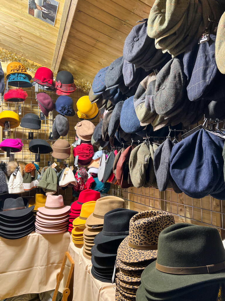 Warm winter hats and caps in market cabin. Copyright@2023 mapanfamily.com 