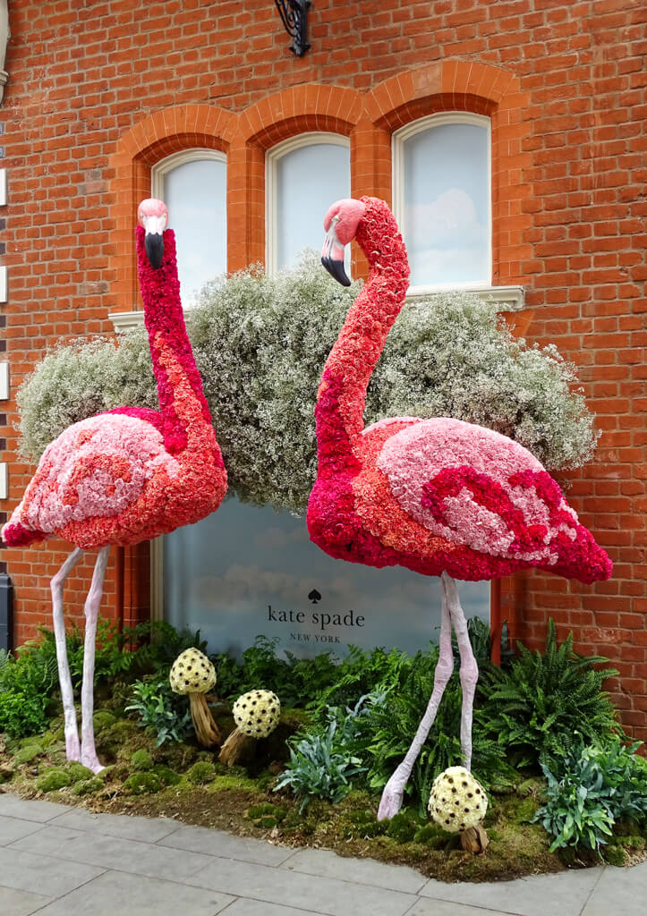 Pink flamingoes made of flowers at Chelsea in Bloom in May, London. Copyright@2024NancyRoberts