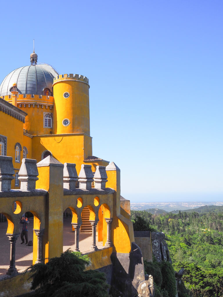 Yellow painted towers and battlements in Sintra, Portugal Copyright@2025 NancyRoberts