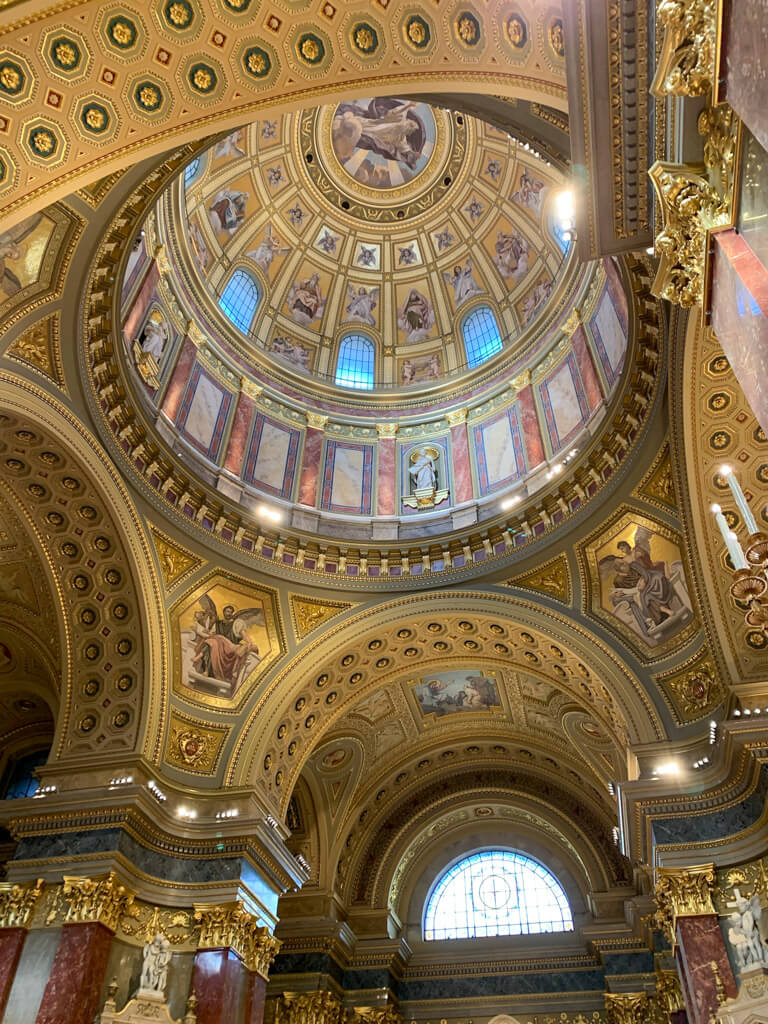 Rich interior of the dome of St Stephen's basilica.Copyright@2025reservedto phtographer via Mapandfamily.com