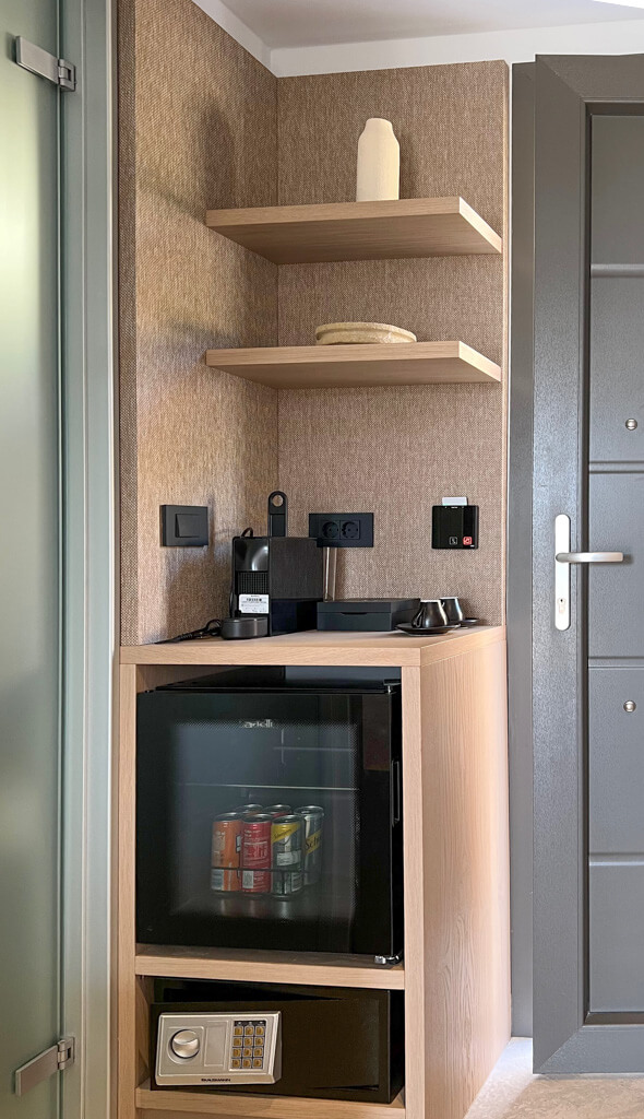 Coffee station, mini fridge and safe in the suite. Copyright@2025 NancyRoberts