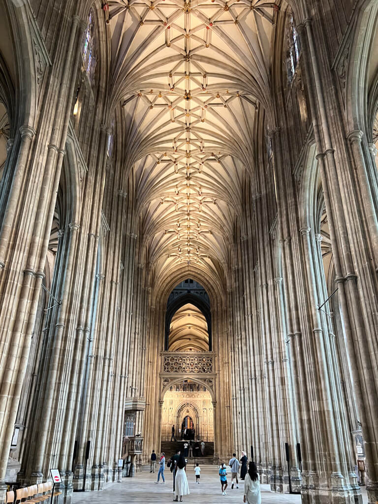 The high arched stone ceilings of Canterbury cathedral's nave. Copyright@2025 Nancy Roberts