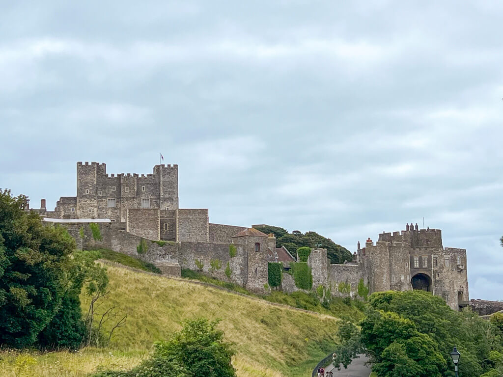 View of Dover Castle's towers and battlements as you approach from the coach park on a day trip to Canterbury and Dover from London Copyright@2025 Nancy Roberts