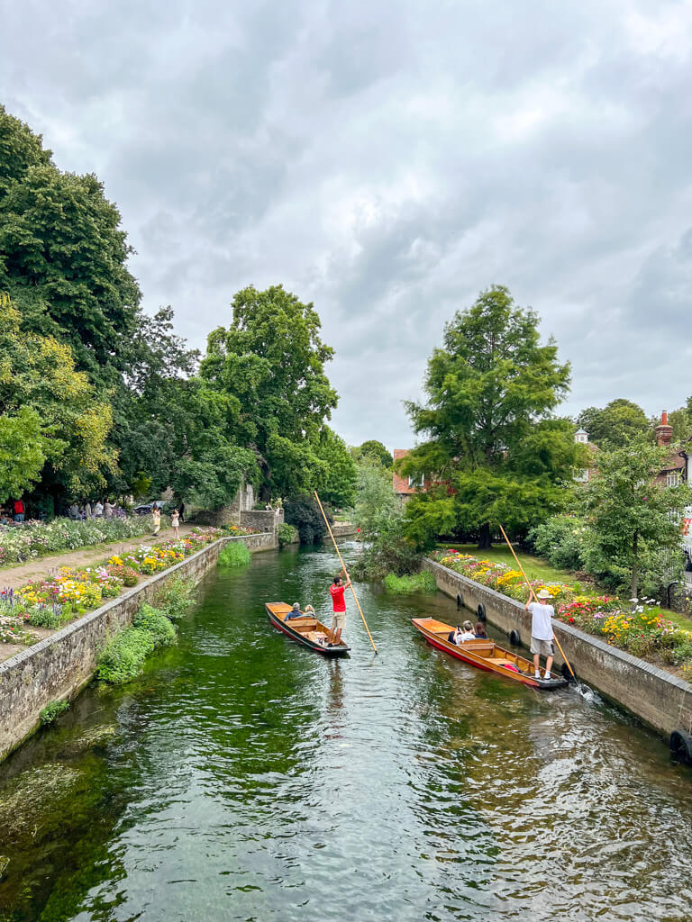 Two punts on the River Stoar passing Westgate Gardens in Canterbury. Copyright@2025 Nancy Roberts