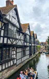 Black and white medieval building by river in Canterbury. Copyright@2025 Nancy Roberts